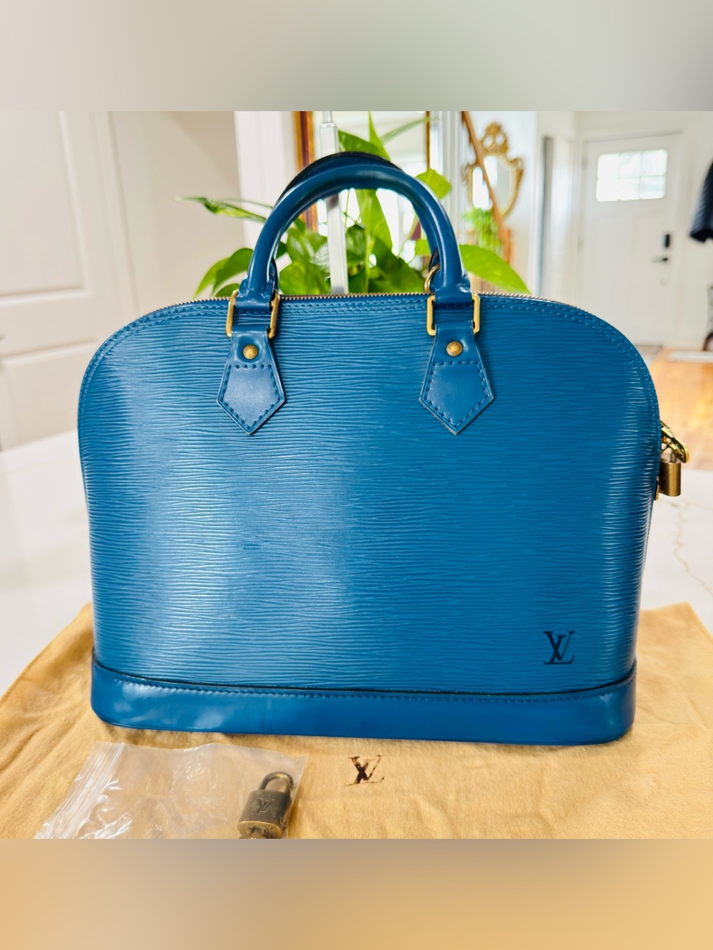 Louis Vuitton Blue Epi Alma Satchel with Gold Hardware